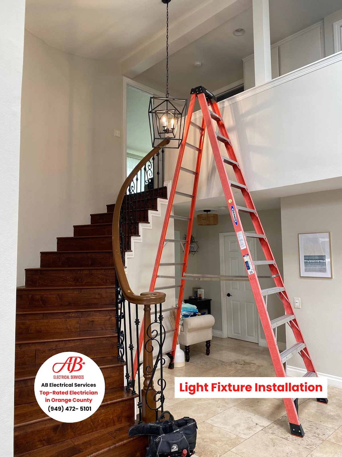 Lantern pendant over a two-story entryway