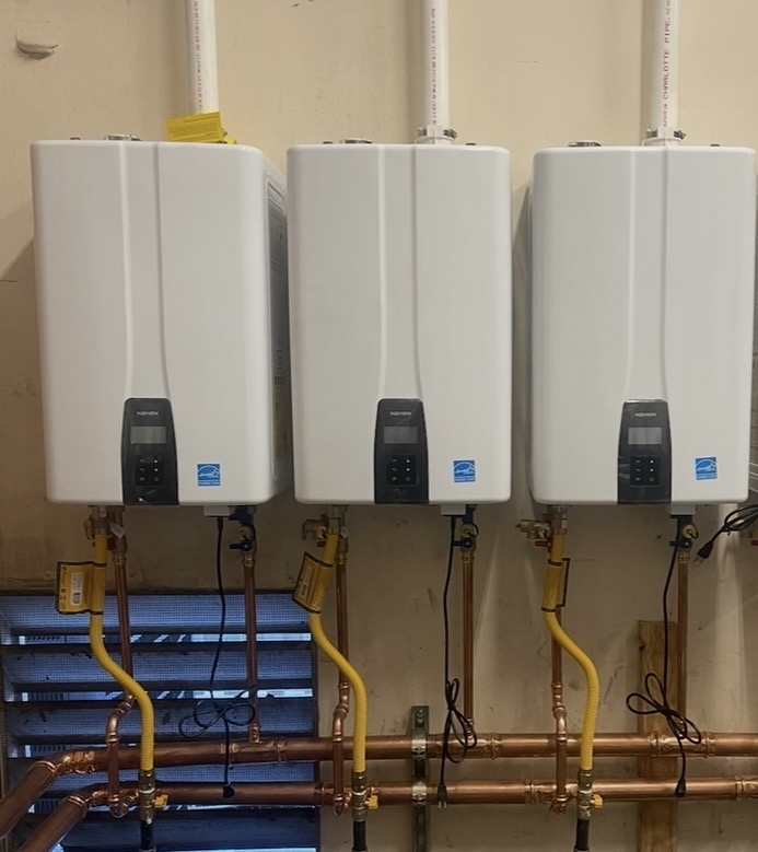 Three Navien tankless heaters, cleanly plumbed