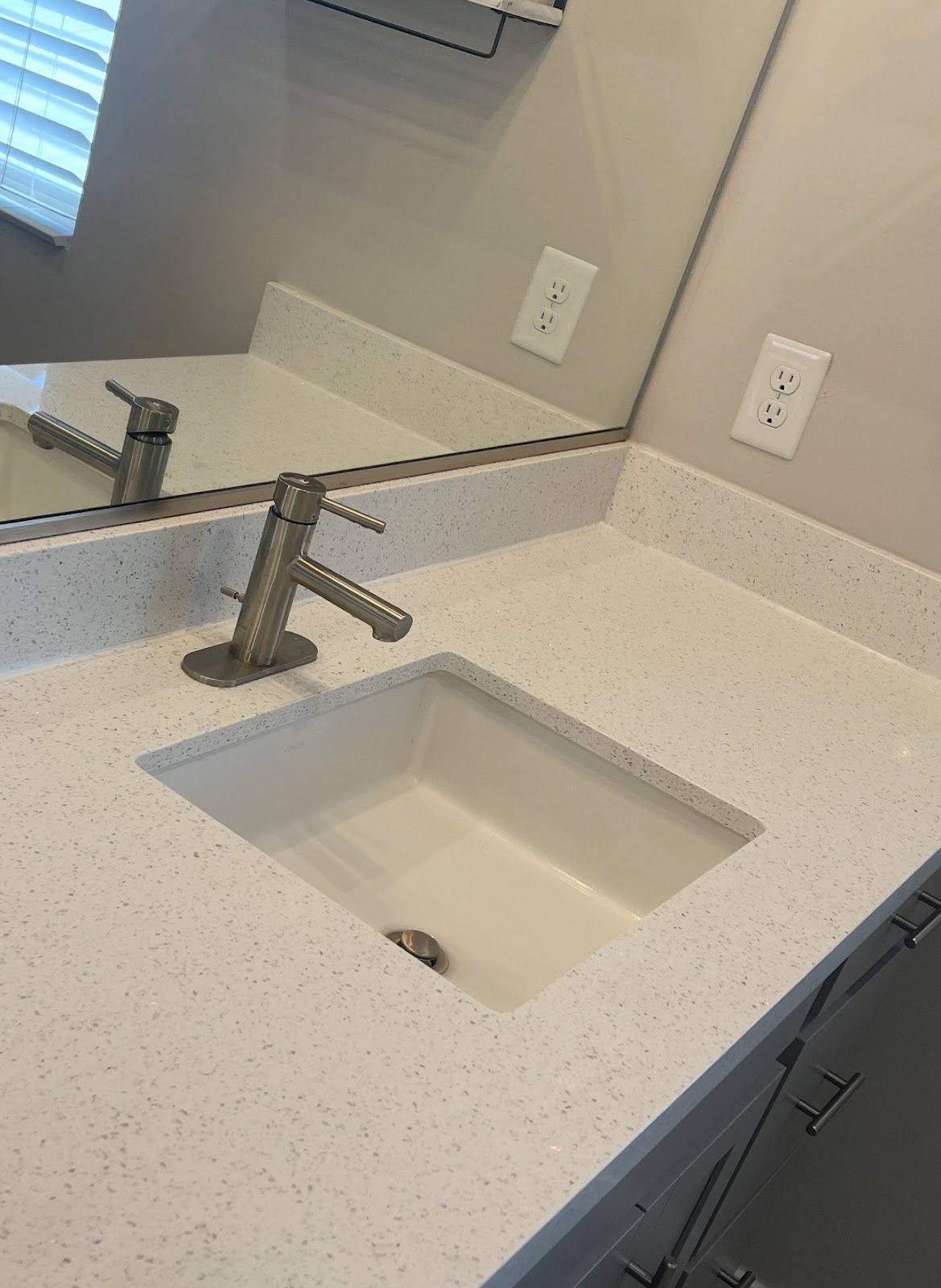 Finished bath: quartz vanity, new faucet and outlet