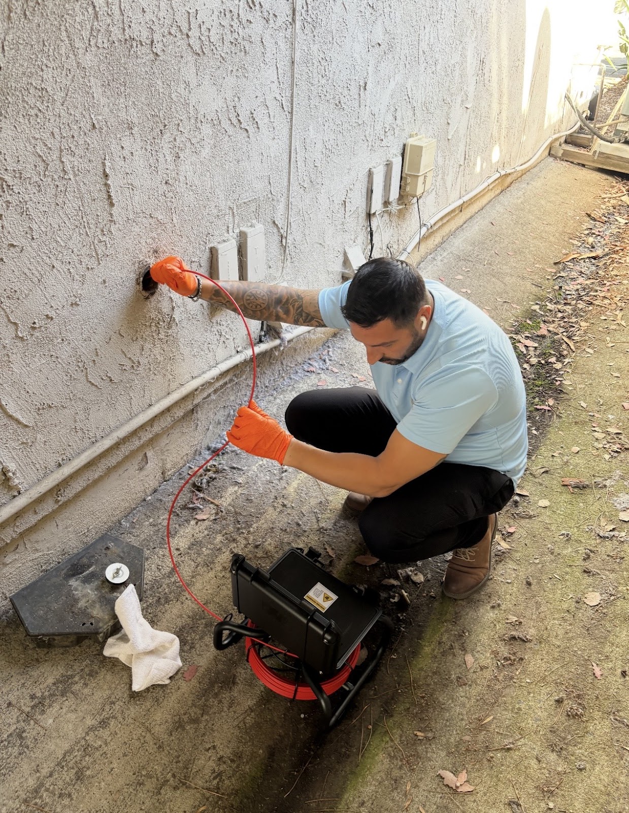 Sewer camera and drain machine on an exterior line