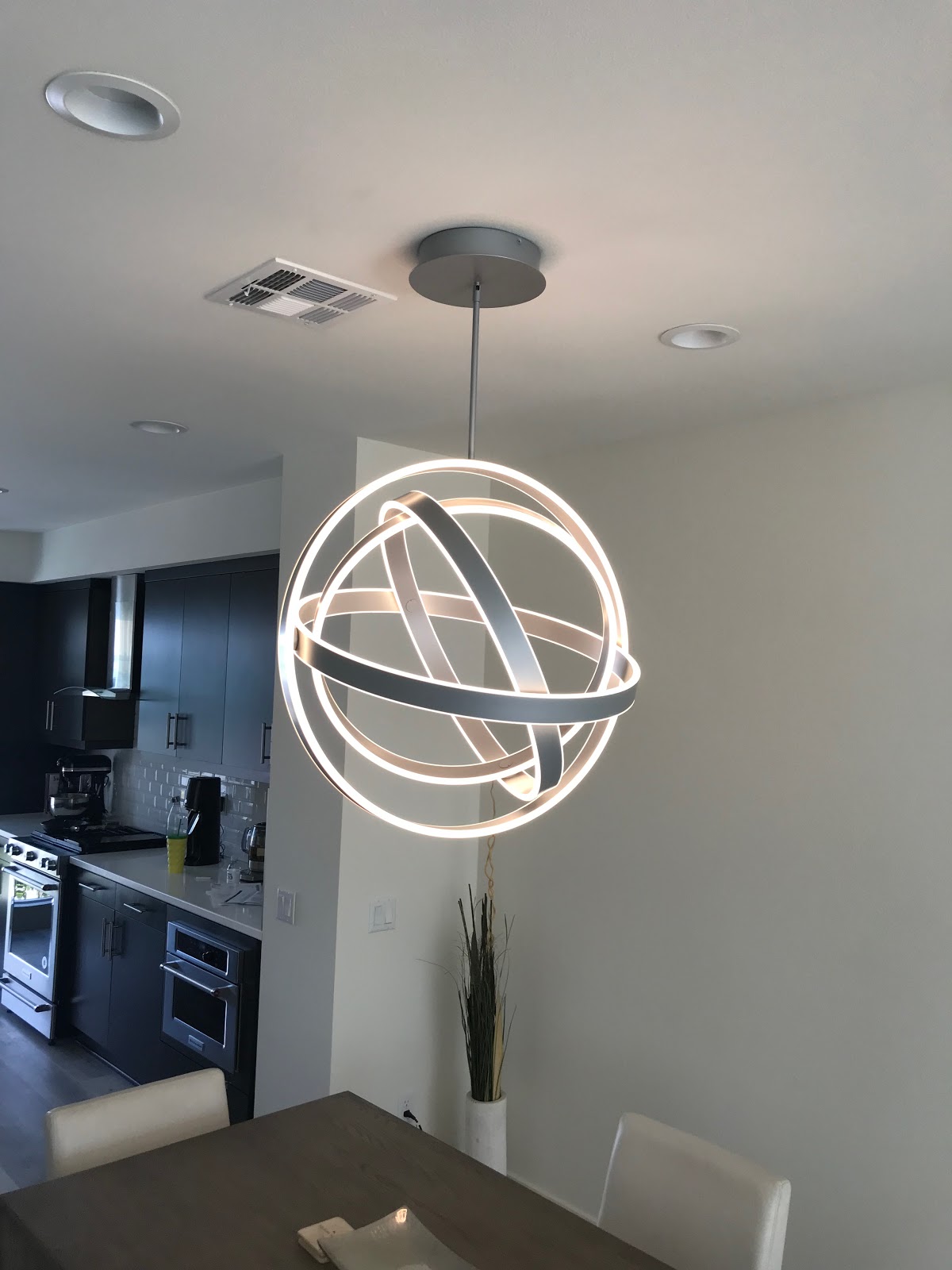 LED orbital pendant, kitchen dining