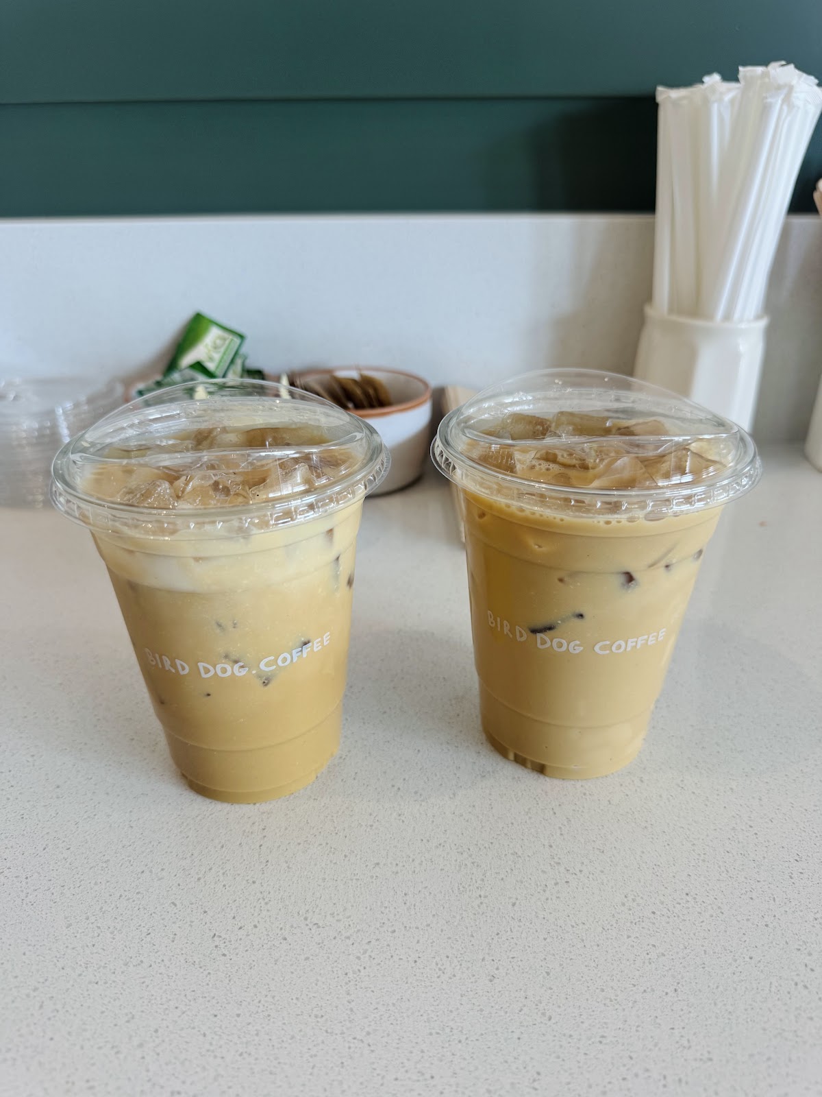 Two iced coffees on the counter at Bird Dog Coffee
