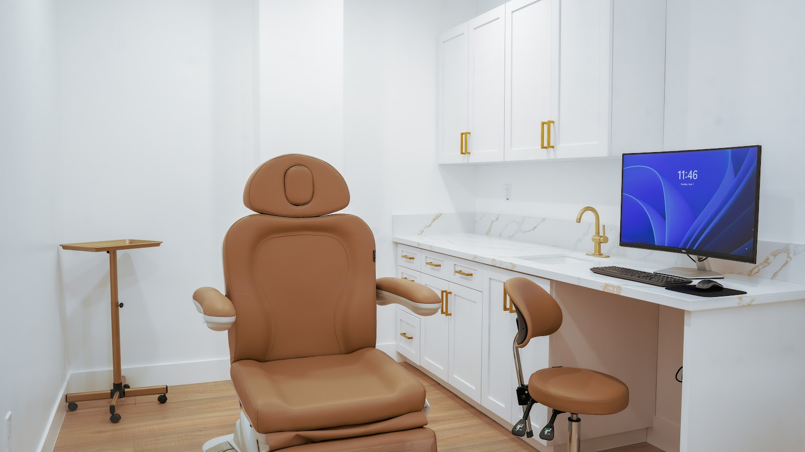 A clean, modern treatment room at Coastal Elegance
