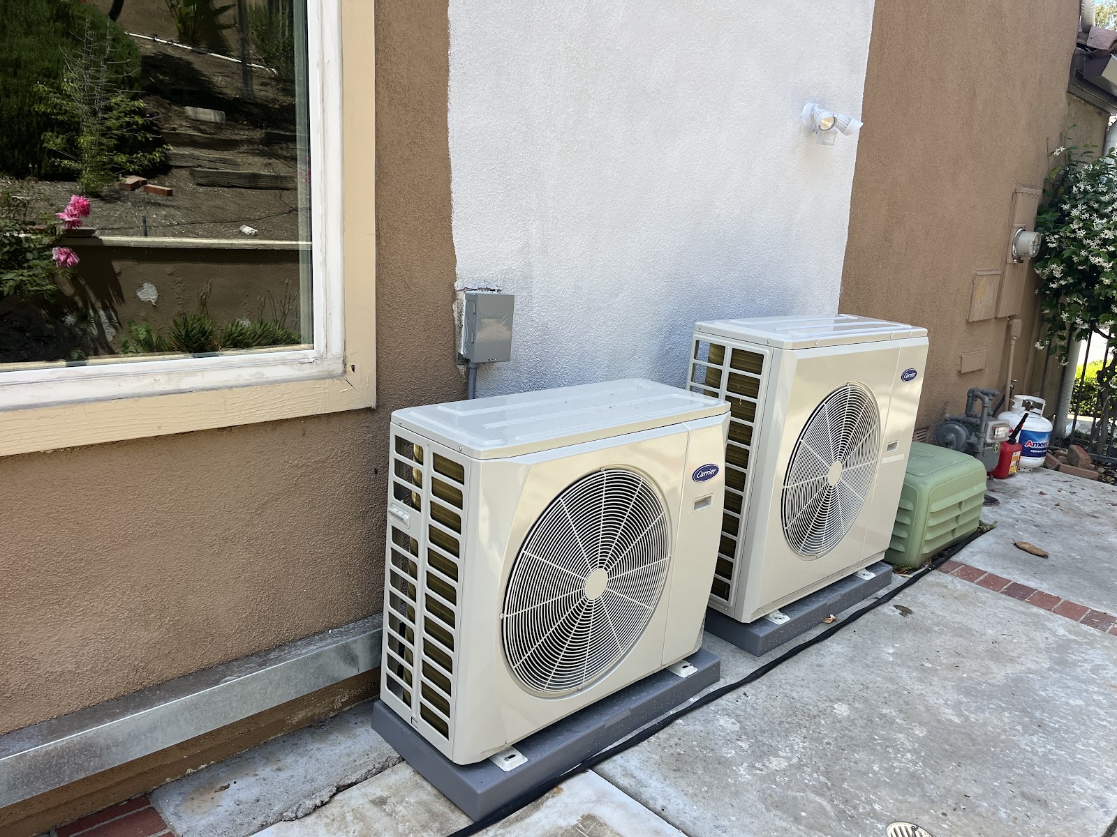 Dual high-efficiency Carrier mini-split condensers installed by DC's Heating & Air
