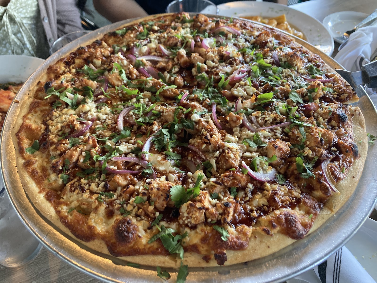 A thin-crust BBQ chicken pizza at Domenico's