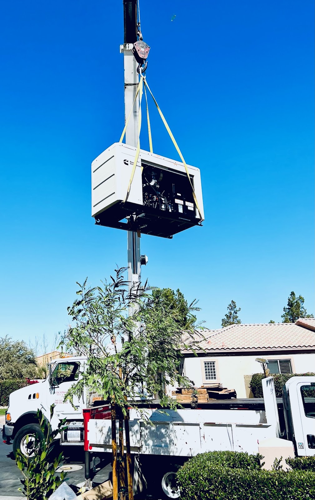 Generator set hoisted by boom crane