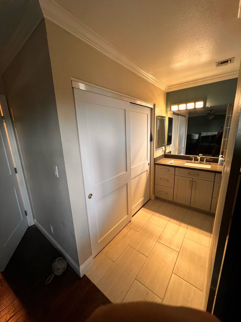 Sliding doors beside the vanity