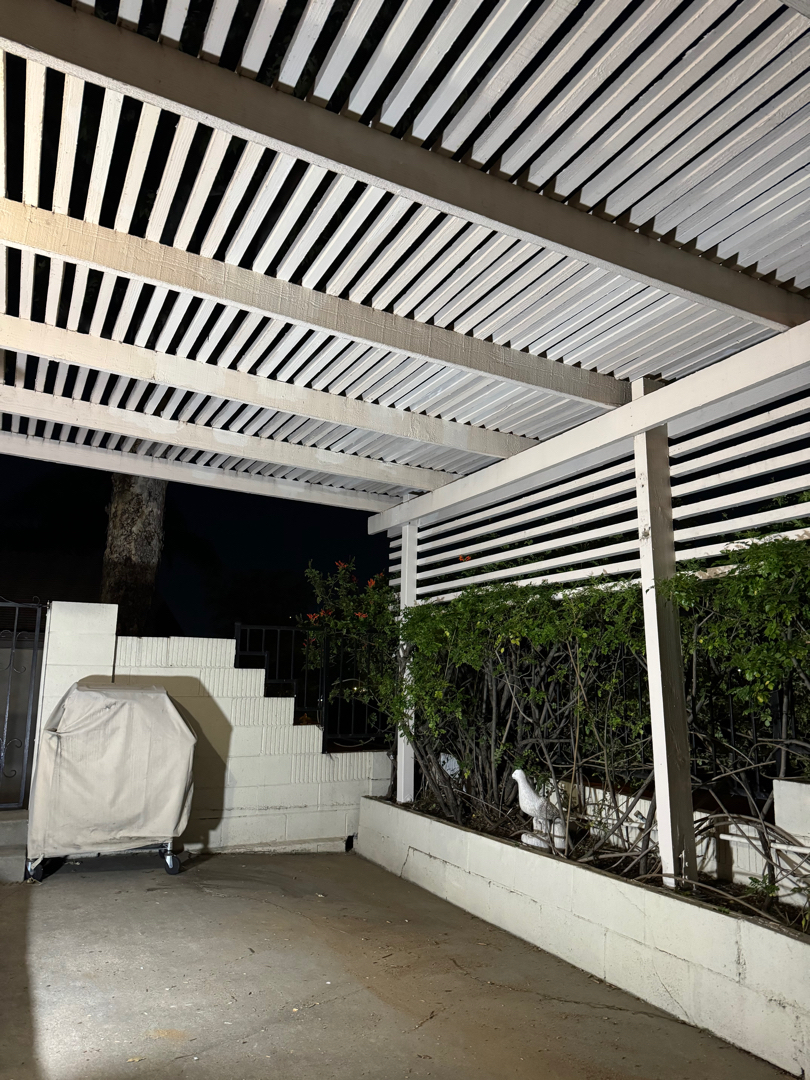 White slatted patio cover and pergola