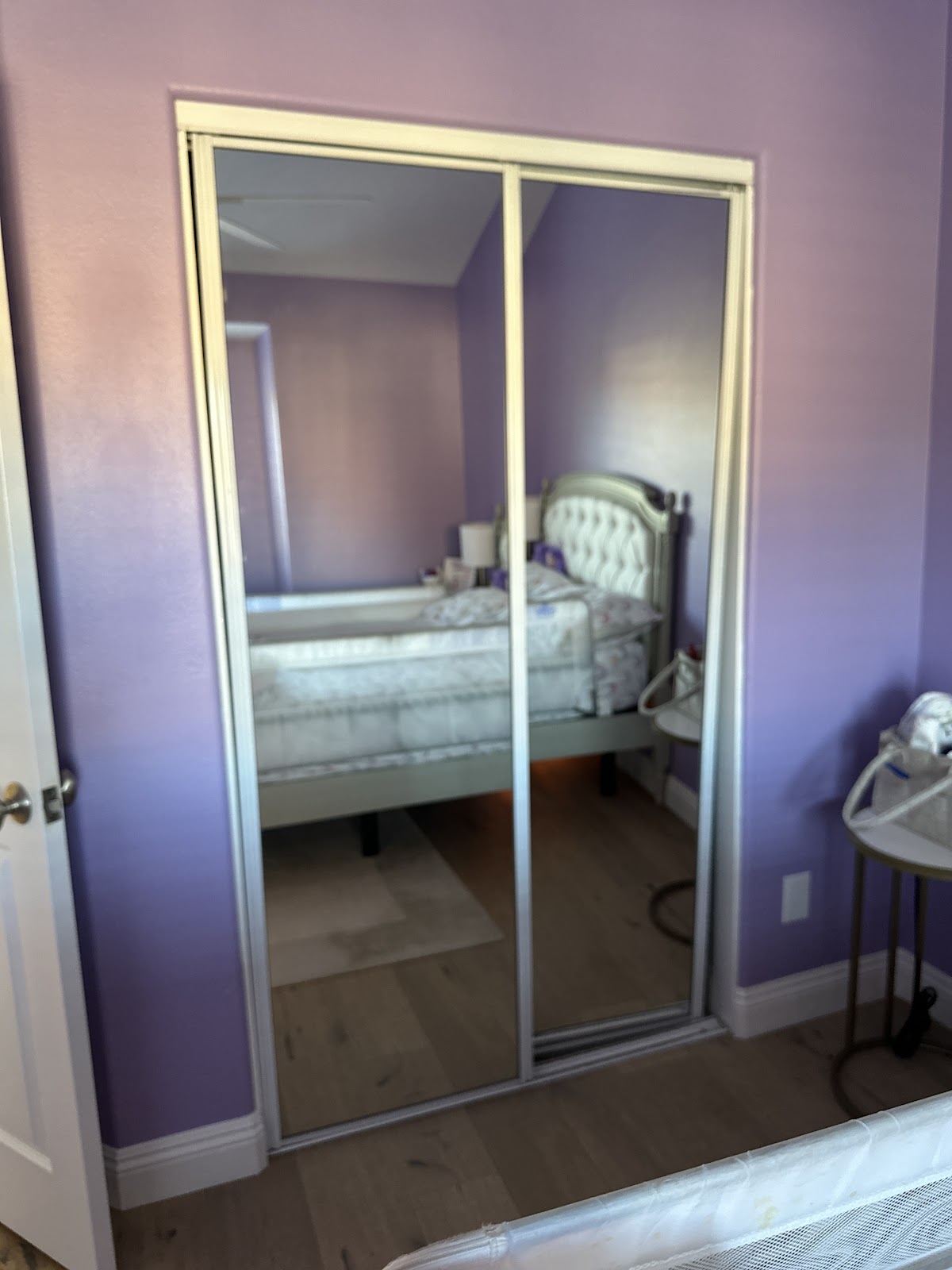 Mirrored sliding closet doors, quiet glide