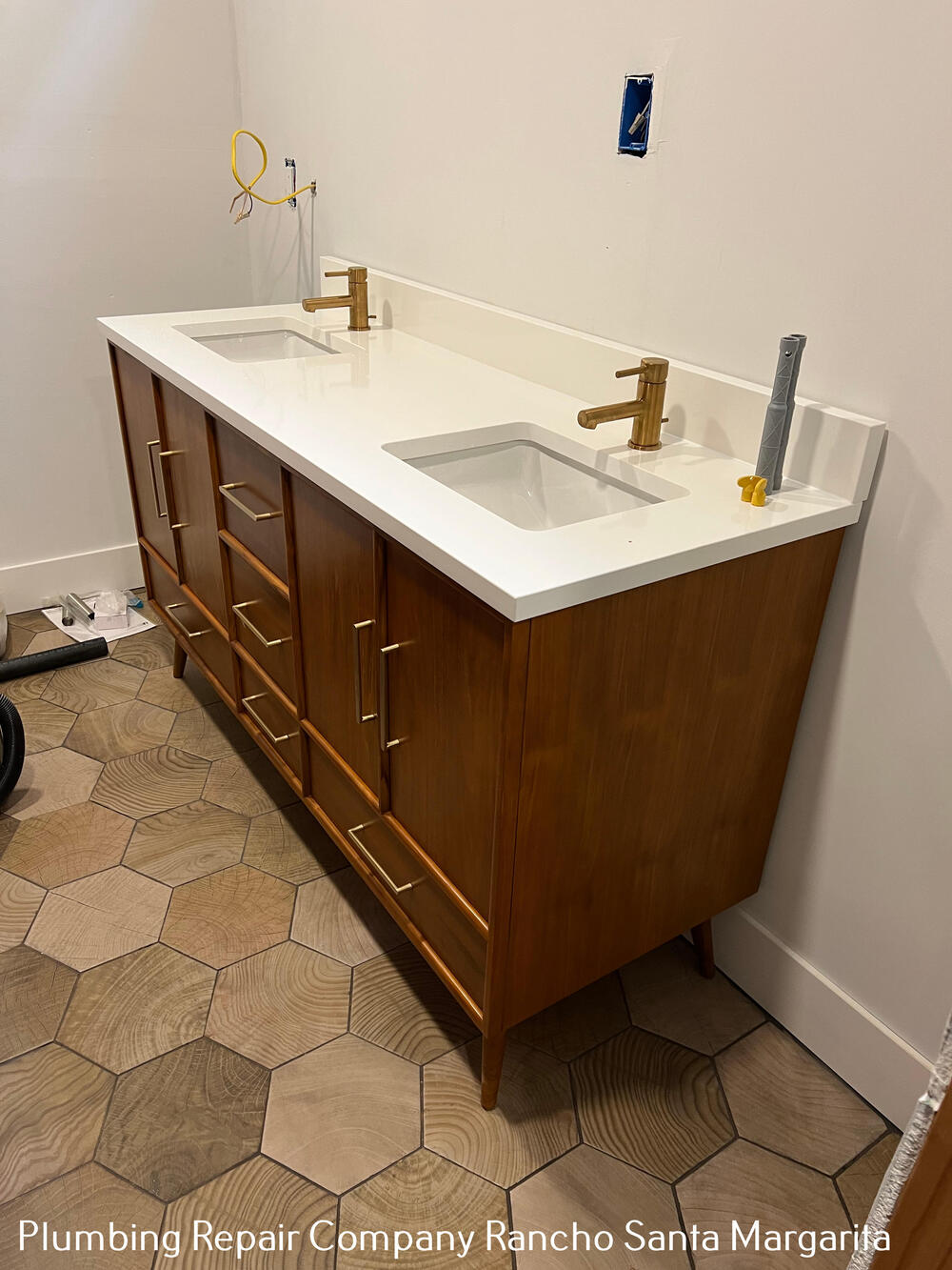 Double vanity set level, quartz top, brass and chrome