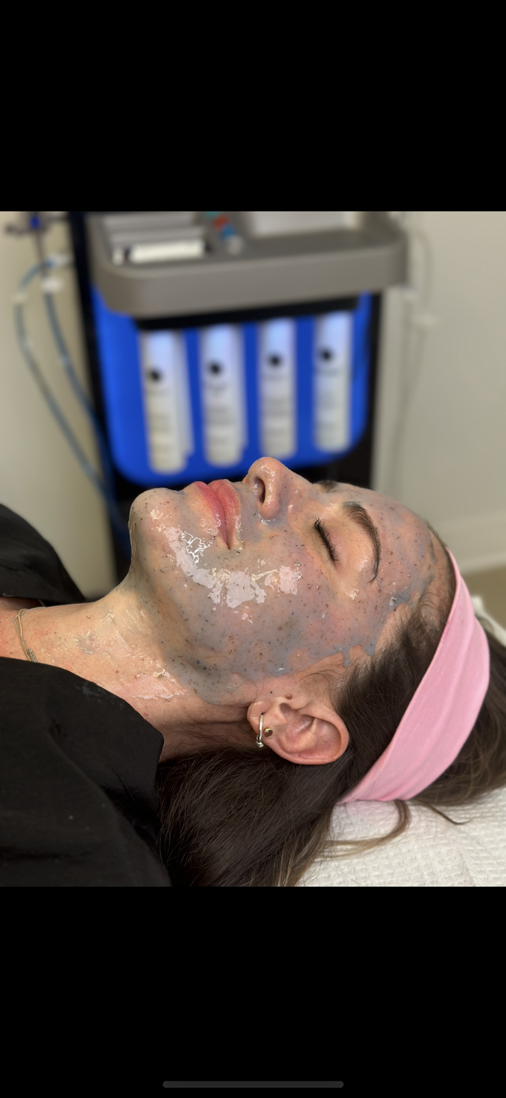A guest mid HydraFacial treatment at MedGlo