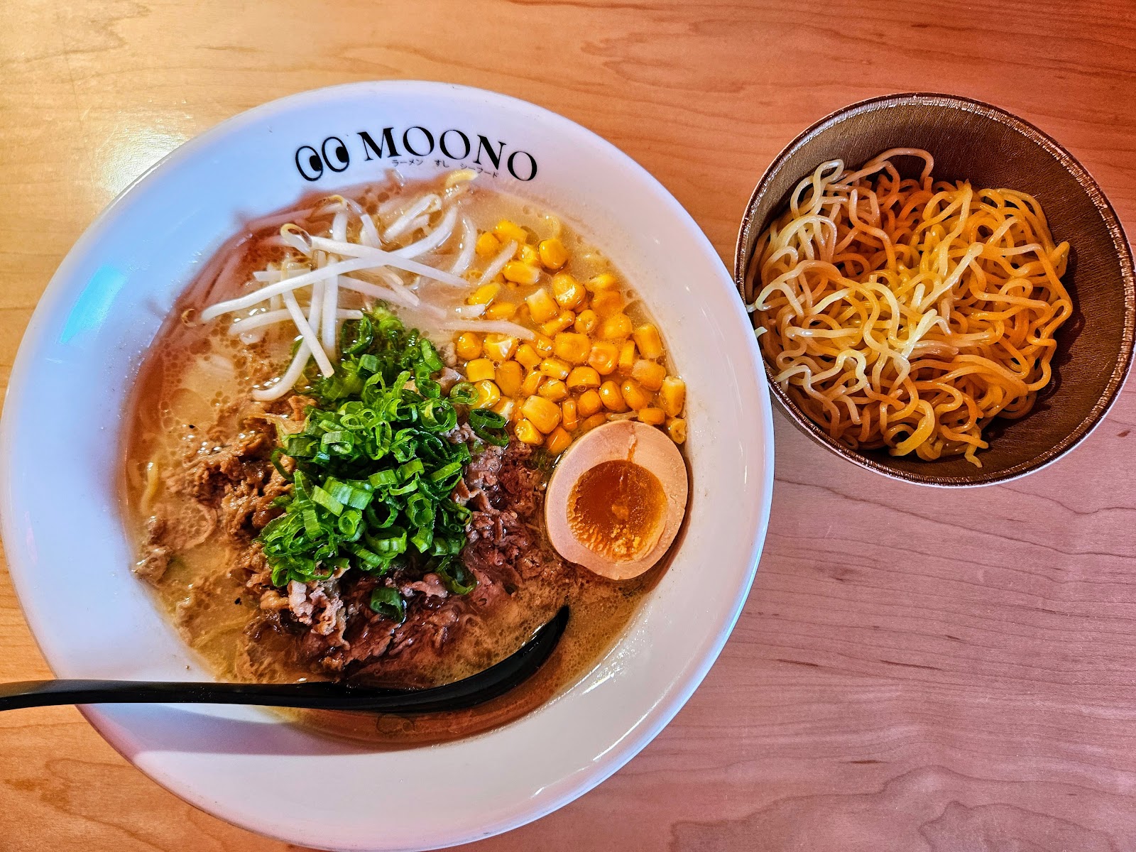 House Ramen at MOONO. Tonkotsu broth, pork chashu, soft egg, bok choy, bean sprout, green onion, mushroom. Served in the MOONO bowl on every table.