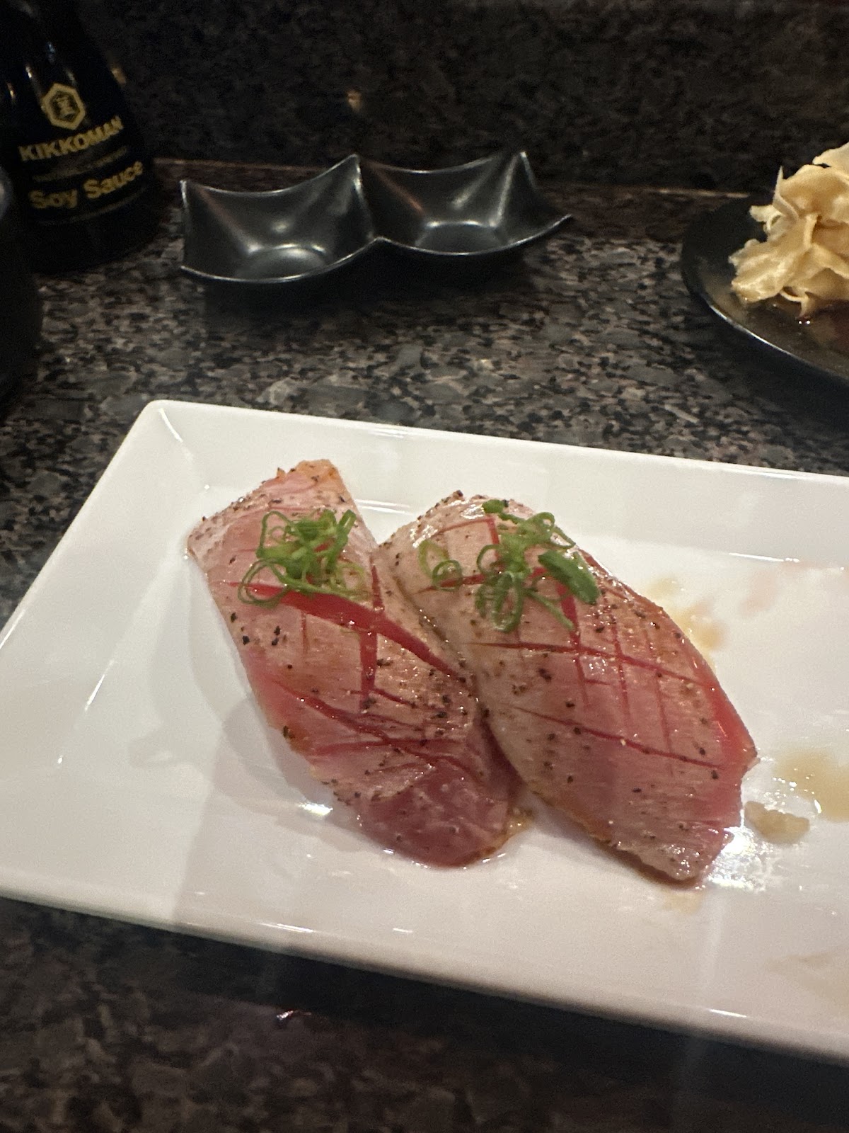 Seared Tuna Sushi at Nami Sushi Bar. Two pieces. Brief flame on the akami.