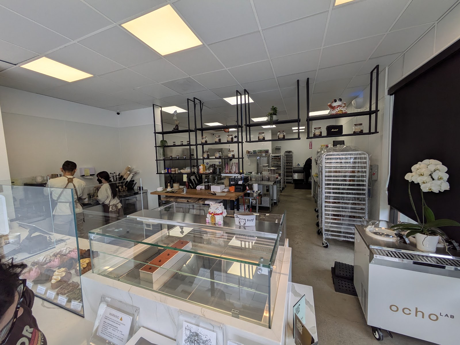 The open kitchen and counter at Ocho Coffee