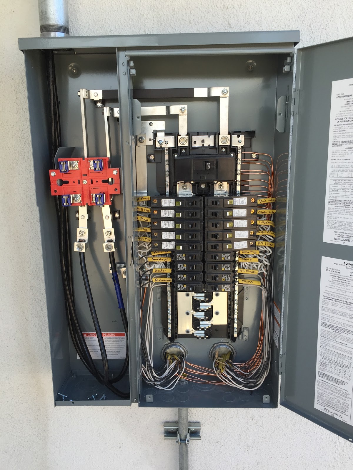 Open Square D electrical sub-panel with neatly labeled breakers, wired by O'Hagan Electric