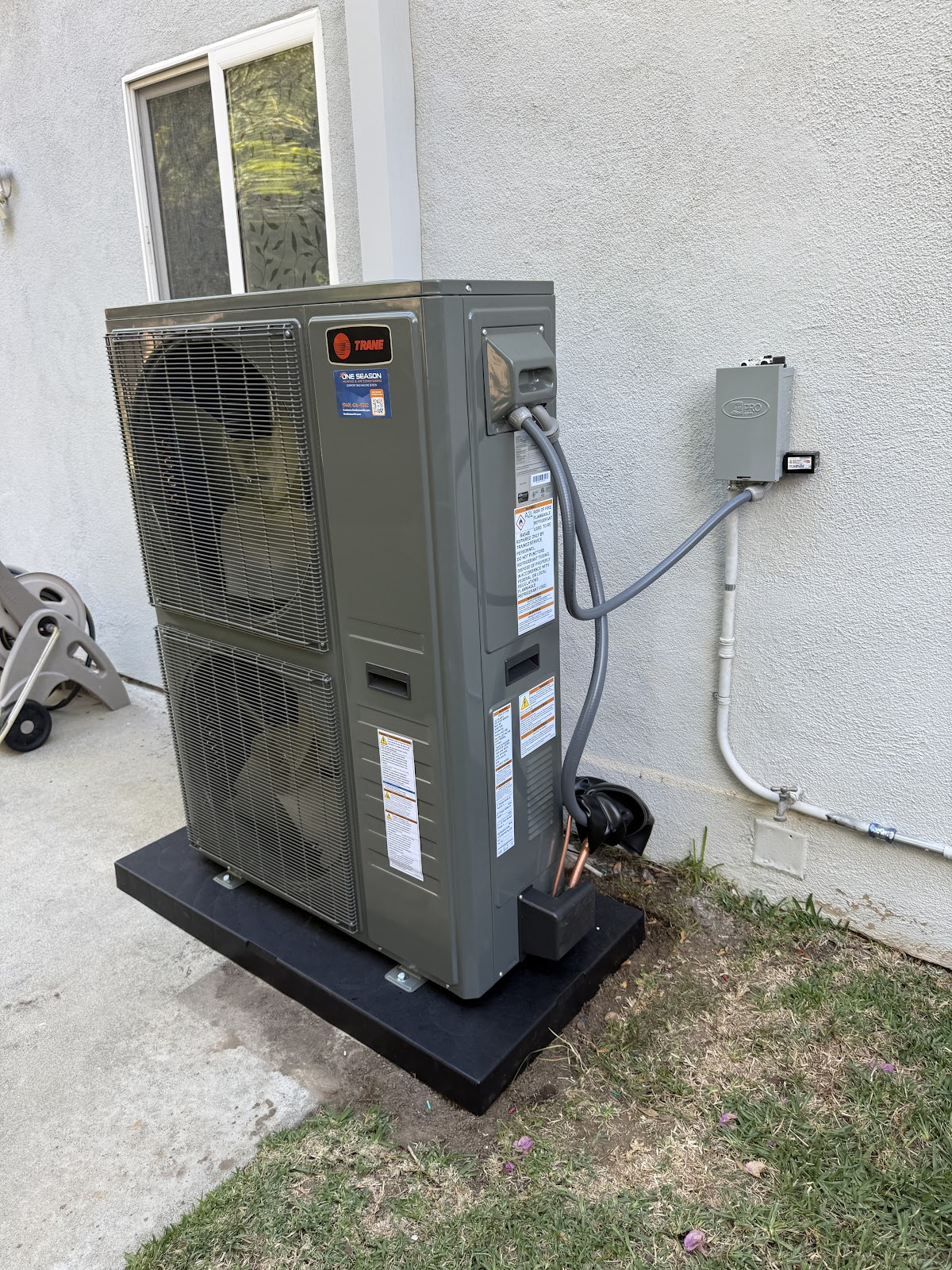 Trane heat-pump condenser + disconnect