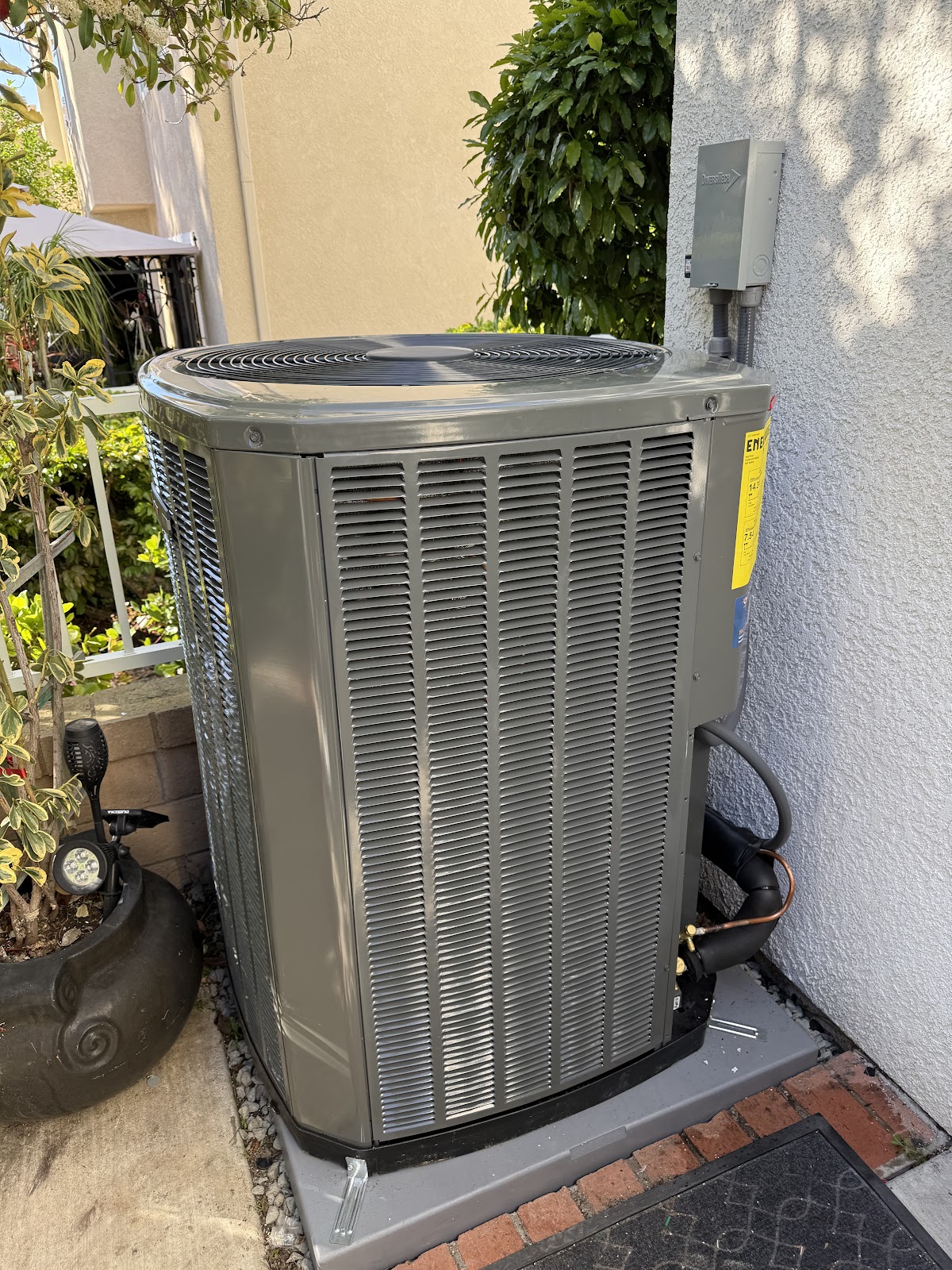 Condenser install against the wall, tucked in clean
