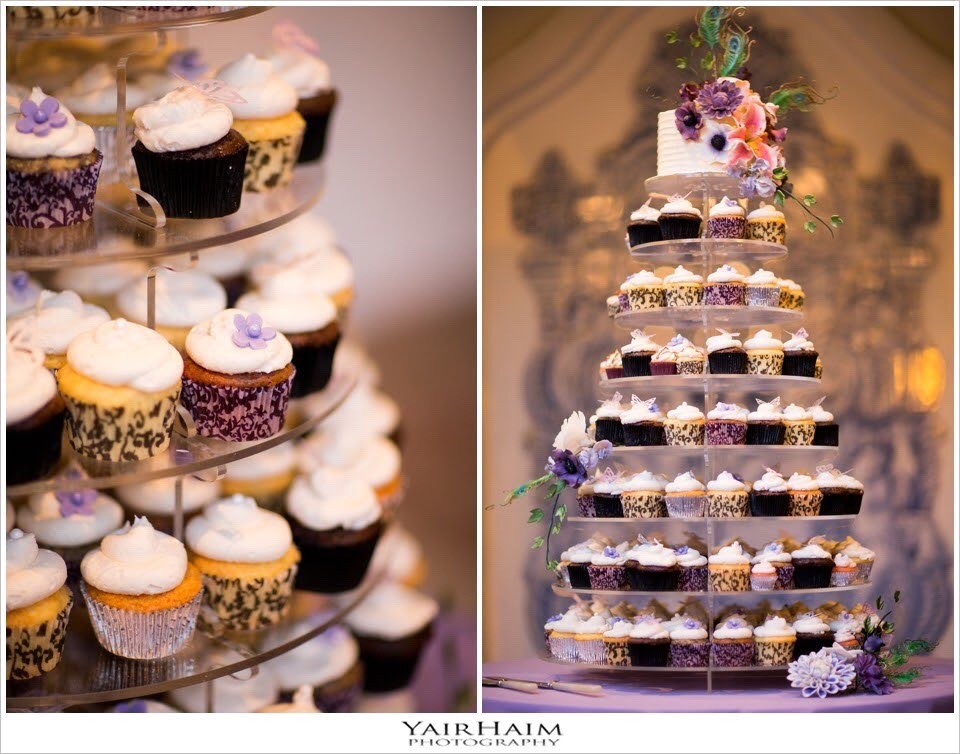 A tower of decorated cupcakes