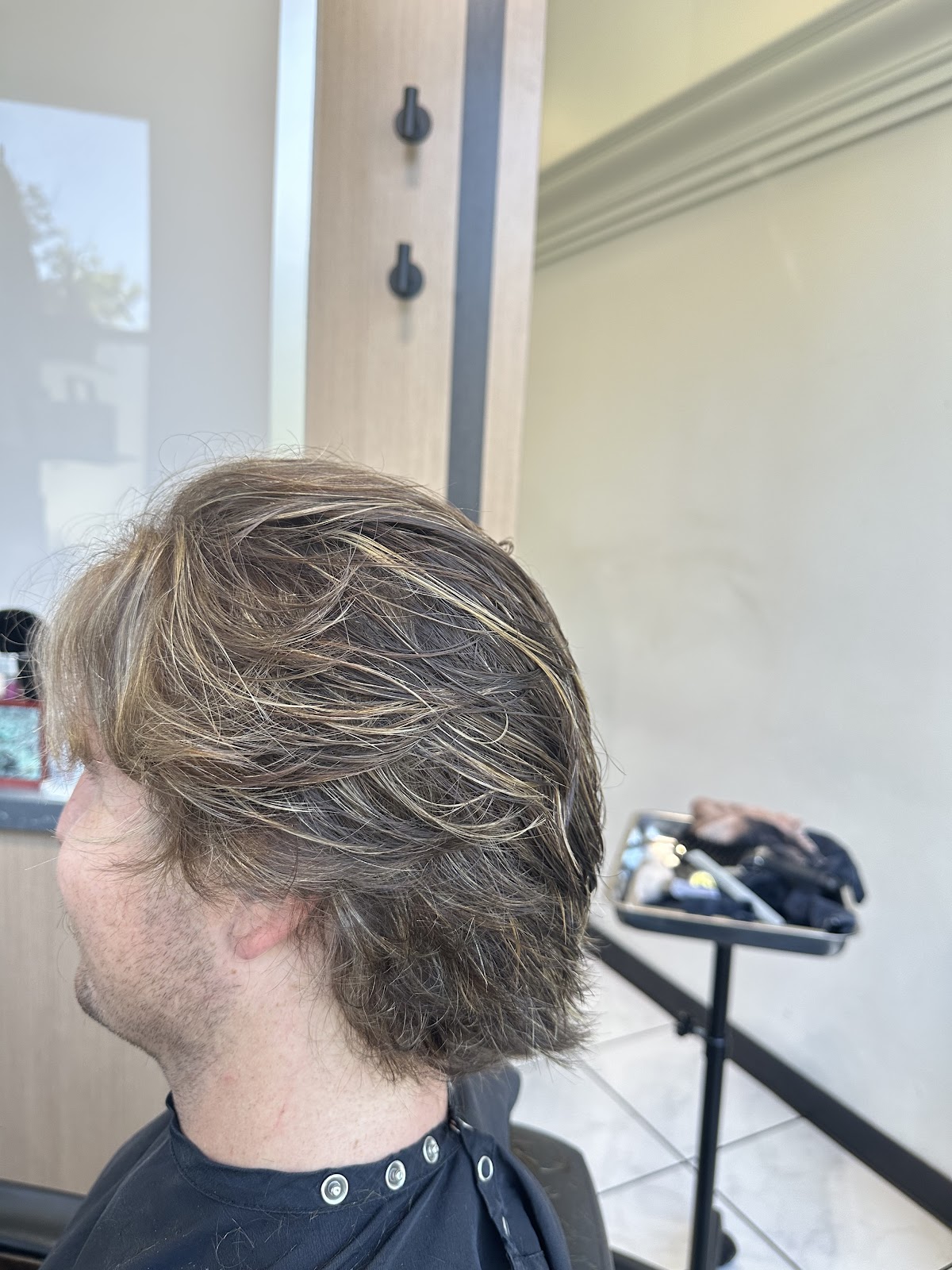 A finished textured men's haircut at Refine Men's Salon