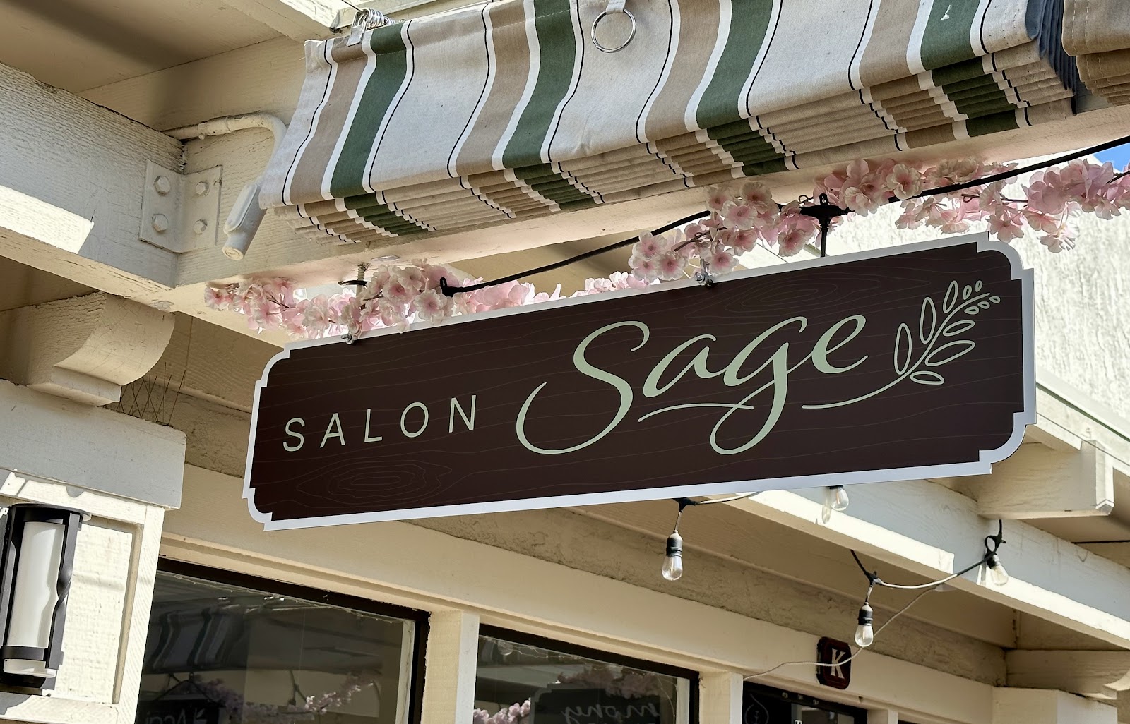 Salon Sage signage at The Patio on Marguerite