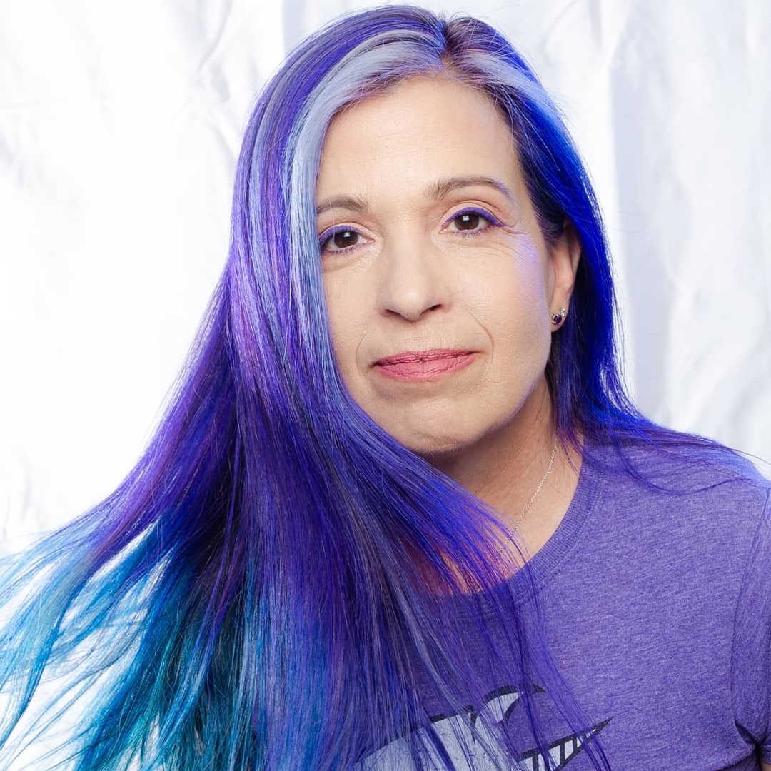 Amethyst and sapphire vivid color, blended down the length of the hair