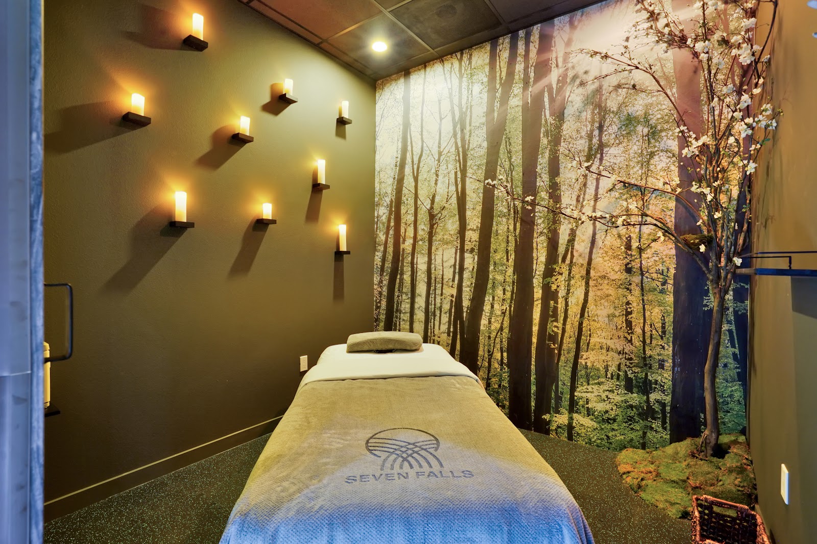 The Seven Falls Special at Seven Falls Massage & Spa. Sixty minutes of full-body work (Swedish or deep tissue), then thirty minutes on the feet in the massage chair. Reviewers come back for it by name.