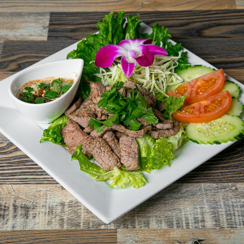 Beef crying tiger salad at SIAM ordered Thai spicy, grilled beef with a bright chili dipping sauce