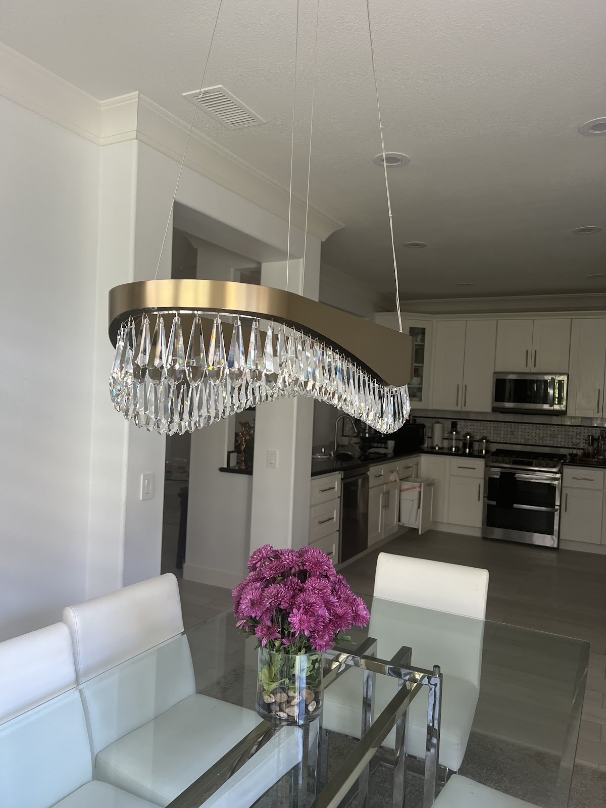 Wave-form crystal pendant, dining room