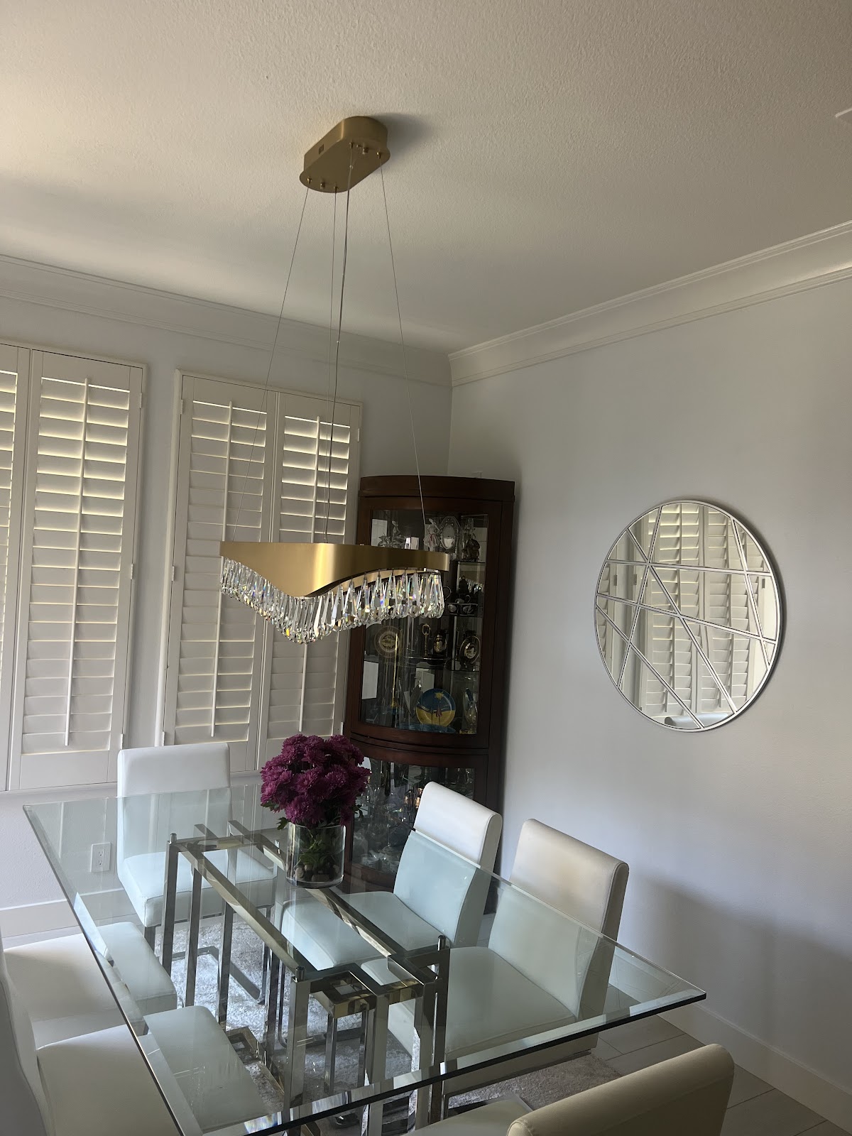 Linear crystal pendant over the dining table