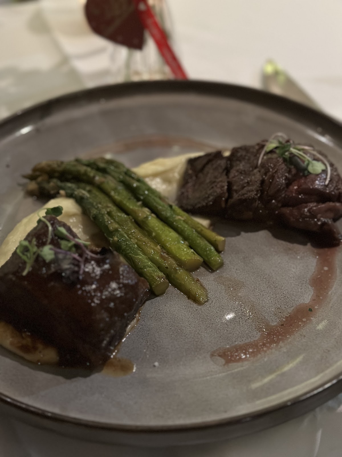 A plated filet mignon with seared asparagus from the shared Dublin 4 kitchen at Wineworks