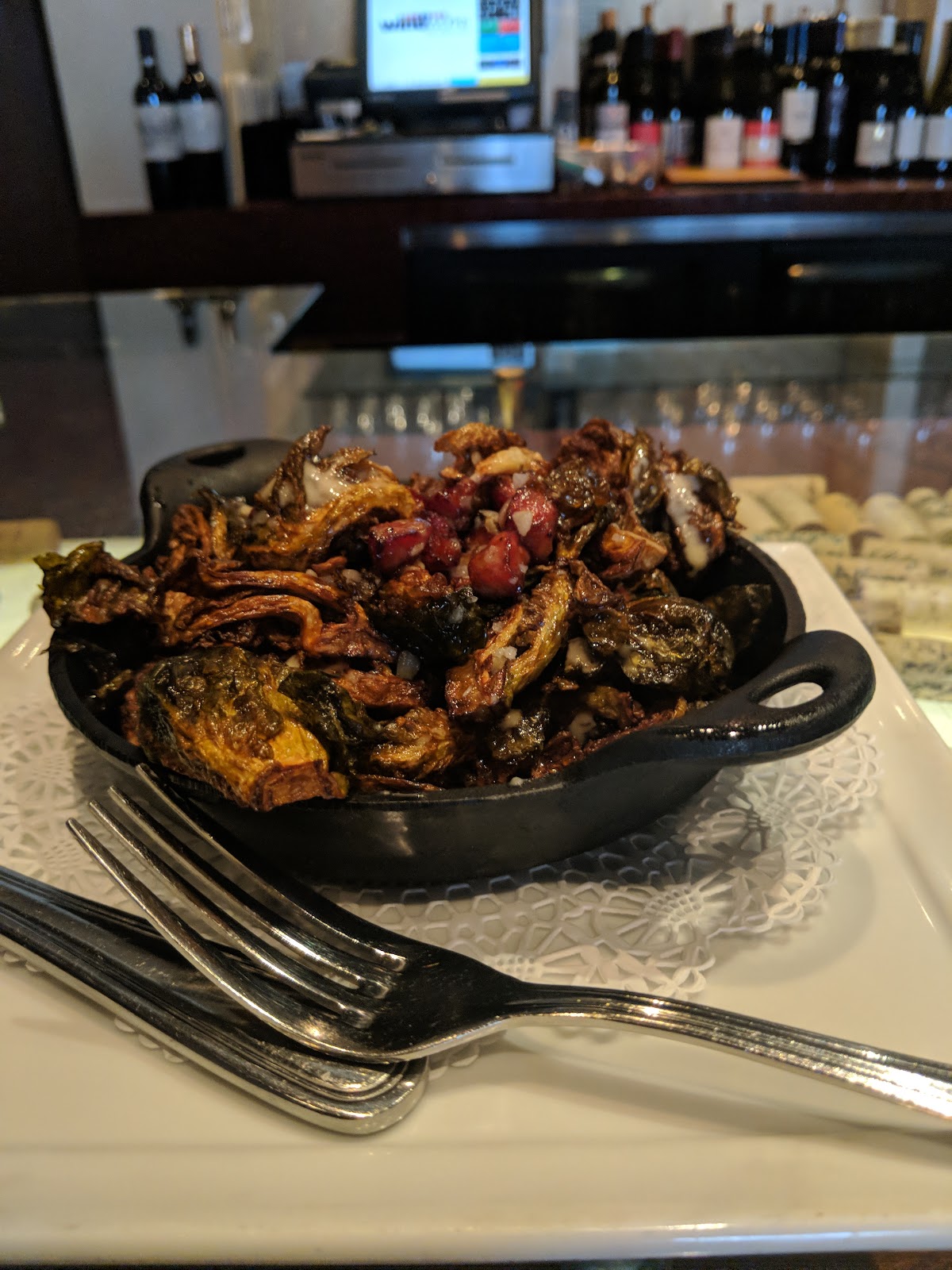 Cast-iron crispy brussels sprouts with pomegranate at the Wineworks bar
