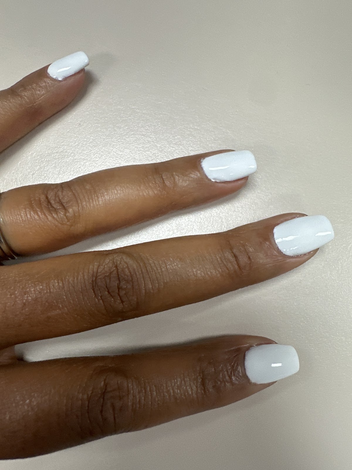 Soft milky-white square manicure from Zen Nail Lounge