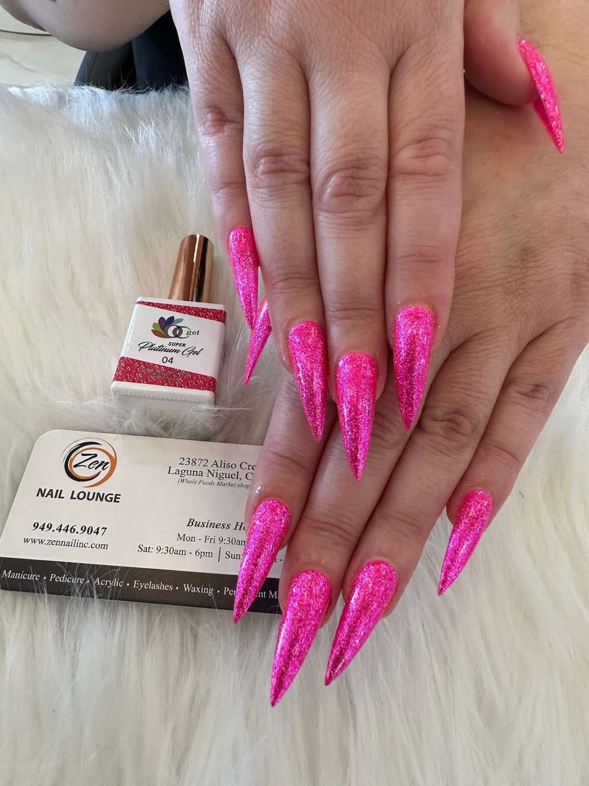 Vivid pink stiletto gel nails at Zen Nail Lounge