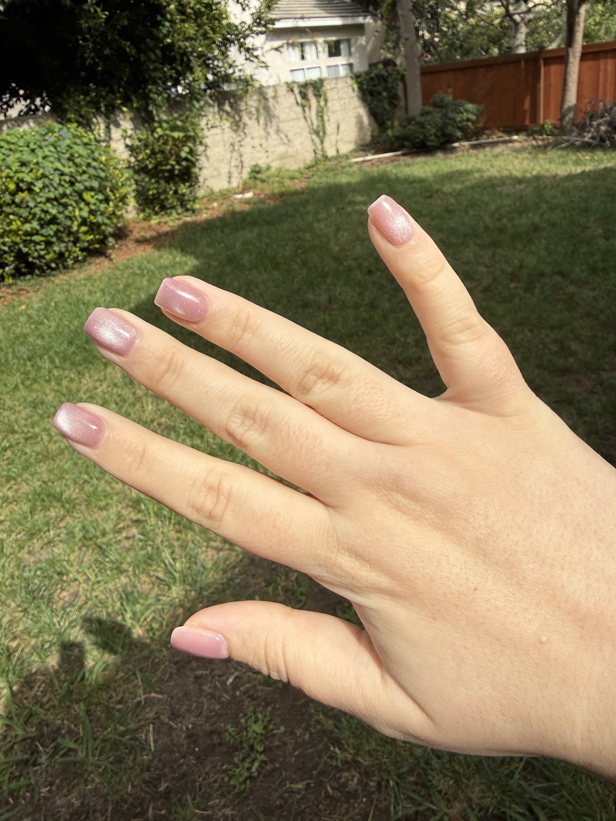 Pearlescent shimmer manicure from Zen Nail Lounge in natural light