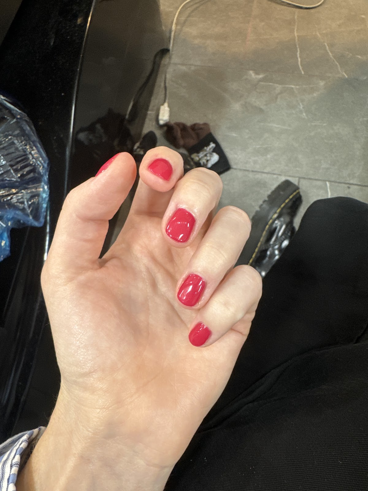 Glossy red manicure