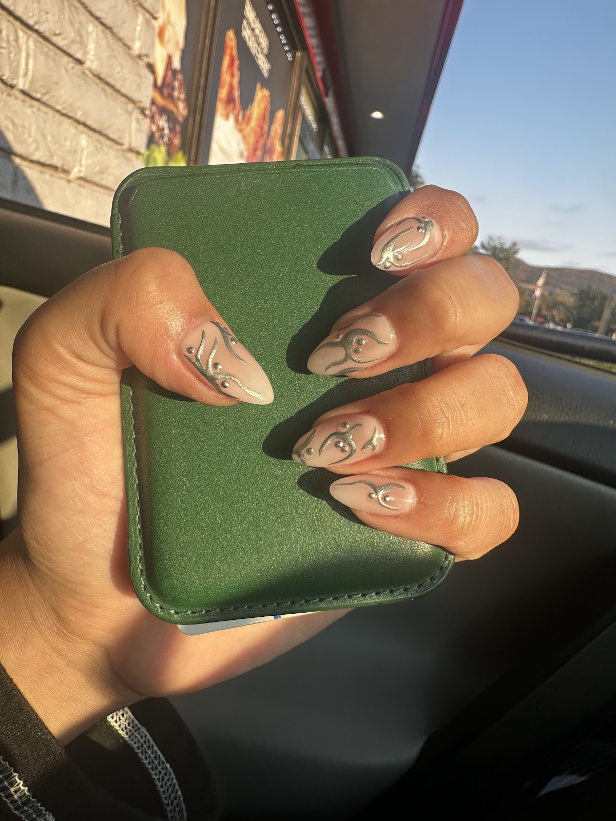 Custom nail art with gold detail